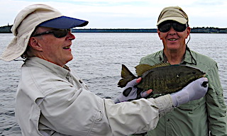 Fly Fishing Trophy Smallmouth Bass at Fireside Lodge in Canada by Doug